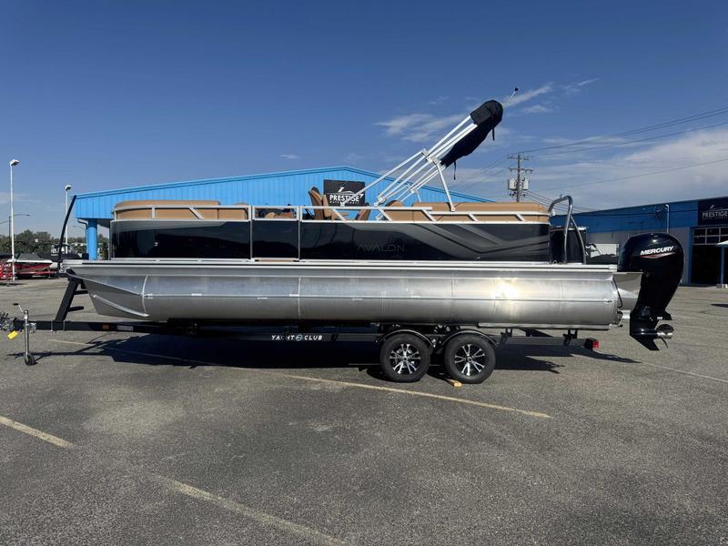 Avalon 2385 25 Venture QL 2025 Avalon 2385 25 Venture QL pontoon boat on trailer, parked outdoors.