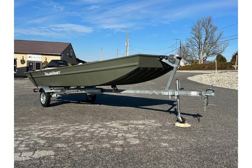 Polar Kraft 1448 Jon Boat, 15" transom with Trailer 2024 Polar Kraft 1448 Jon Boat with trailer, parked outdoors on a sunny day.