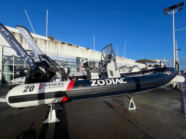 Zodiac Pro 7 Vendée Globe 2025 Zodiac Pro 7 Vendée Globe boat displayed outdoors on stands.