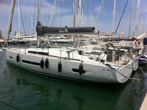 Hanse 460 2022 Hanse 460 yacht docked in marina, sleek design, modern sailboat.