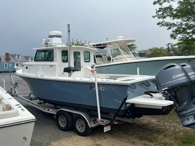 Parker 2520 XLD Sport Cabin 2022 Parker 2520 XLD Sport Cabin boat on trailer with Yamaha engine.