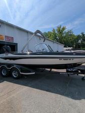 Ranger 2080MS 2023 Ranger 2080MS boat on trailer, parked outside a building.