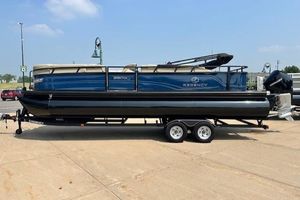 Regency 250 DL3 2023 Regency 250 DL3 pontoon boat on a trailer, parked outdoors.