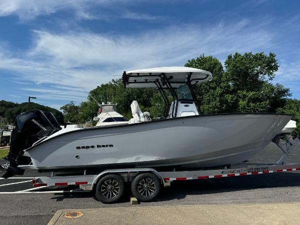 Cape Horn 27 XS 2025 Cape Horn 27 XS boat on trailer, parked outdoors under clear sky.