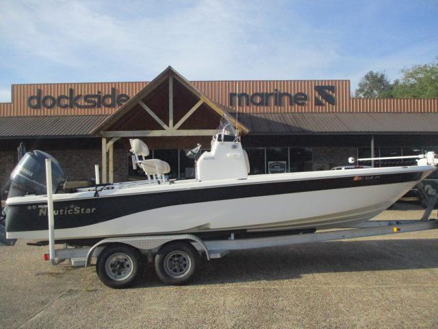 NauticStar 244 XTS 2014 NauticStar 244 XTS boat on trailer at Dockside Marine dealership.