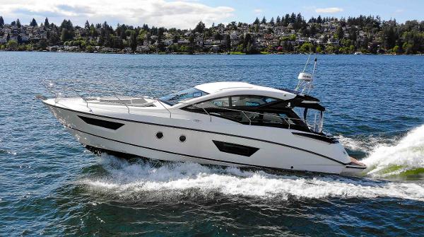 Beneteau Gran Turismo 40 2018 Beneteau Gran Turismo 40 yacht cruising on a scenic lake.