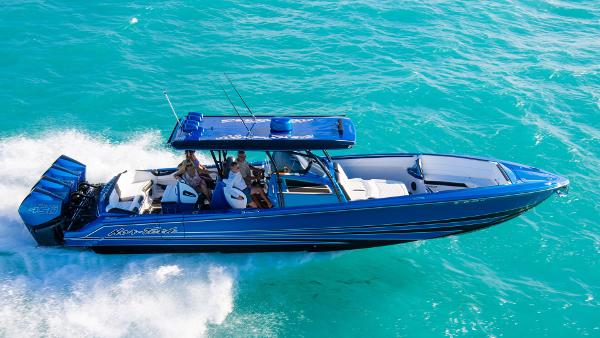 Nor-Tech 390 Sport Center Console 2026 Nor-Tech 390 Sport Center Console boat cruising on turquoise water.
