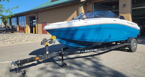 Tahoe 185 S 2025 Tahoe 185 S boat on trailer, blue and white design, parked outdoors.