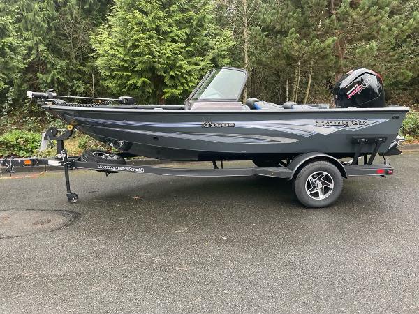 Ranger VS1682SC Angler 2024 Ranger VS1682SC Angler boat on trailer, parked outdoors.