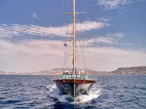 Custom Motor Sailor Custom 2007 Motor Sailor yacht sailing on open sea under clear skies.