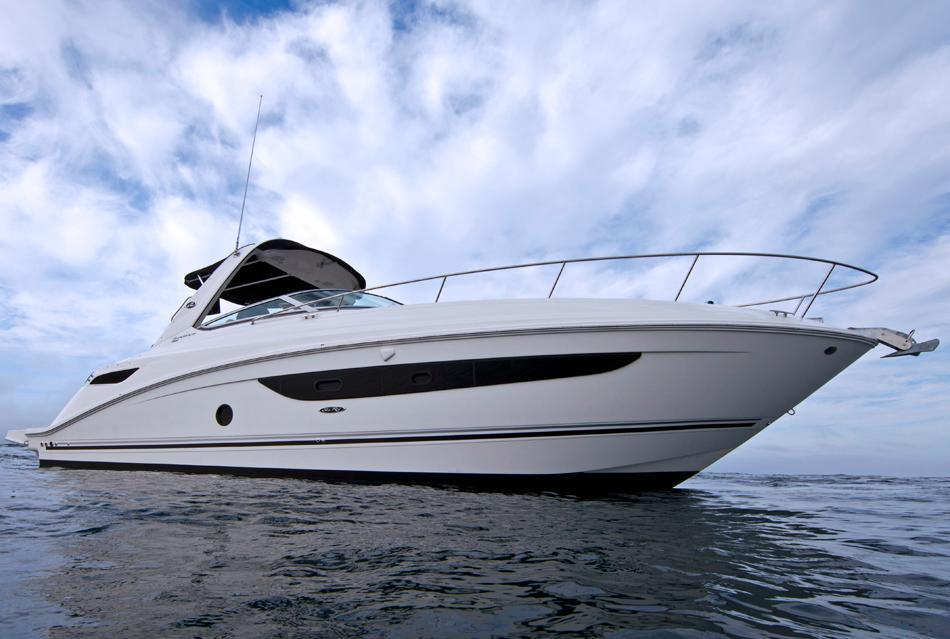 Sea Ray 350 Sundancer 2013 Sea Ray 350 Sundancer yacht on open water under cloudy sky.