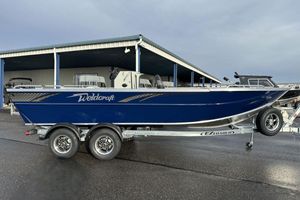 Weldcraft 200 Rebel Open CC 2026 Weldcraft 200 Rebel Open CC boat on trailer, parked outdoors.