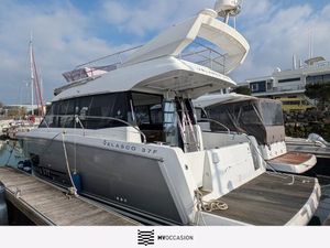 Jeanneau Velasco 37F 2017 Jeanneau Velasco 37F yacht docked at marina under cloudy sky.