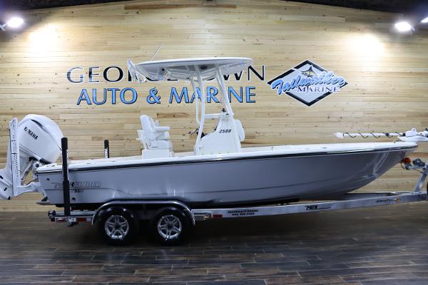 Pathfinder 2500 Hybrid 2025 Pathfinder 2500 Hybrid boat on trailer at Georgetown Auto & Marine showroom.