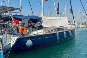 Beneteau Oceanis 46 2009 Beneteau Oceanis 46 sailboat docked in a marina, surrounded by other vessels.