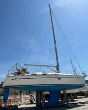 Bavaria 38 Cruiser 2011 Bavaria 38 Cruiser sailboat on stands under clear blue sky.