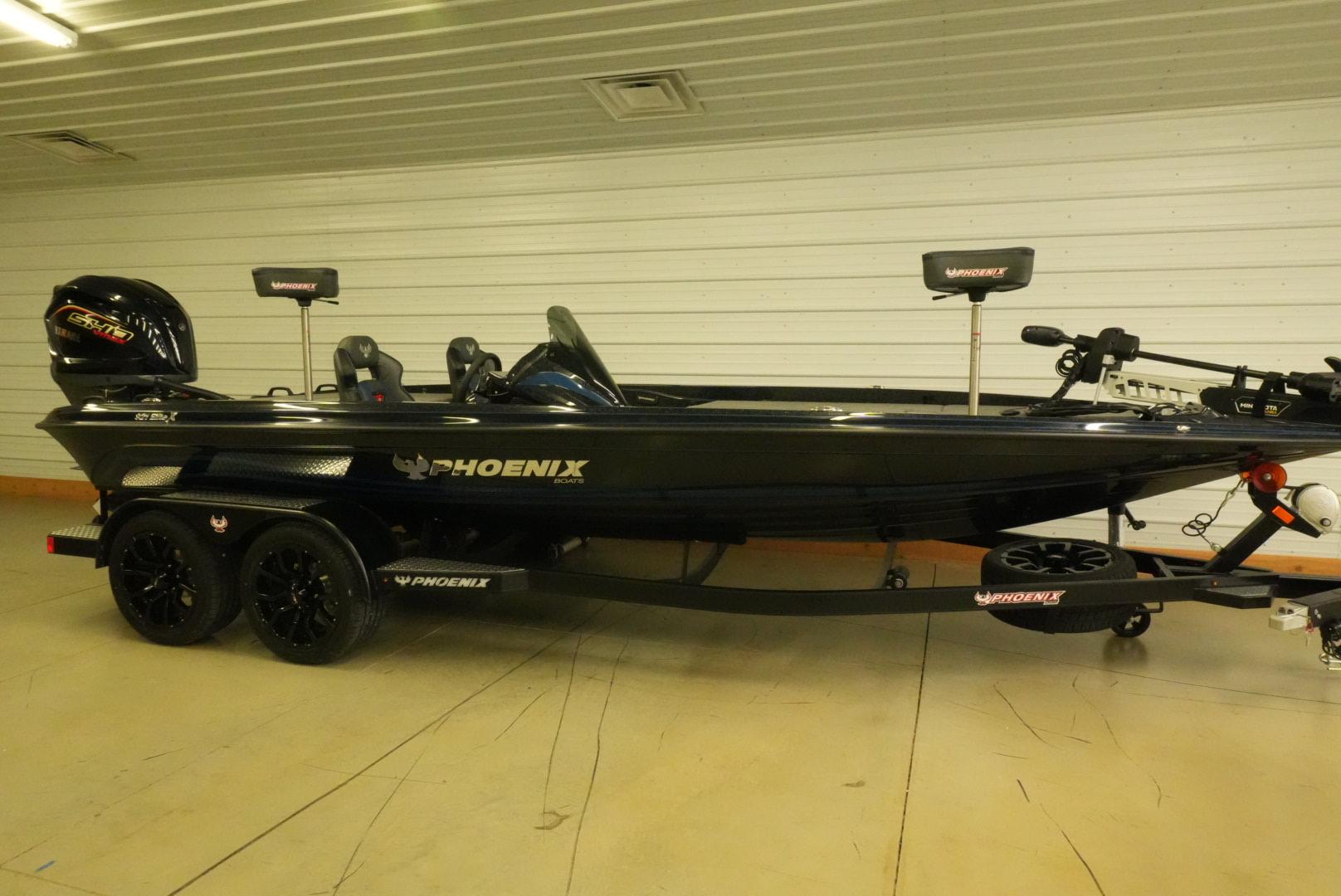 Phoenix 921 Elite X 2026 Phoenix 921 Elite X boat on trailer in indoor setting.