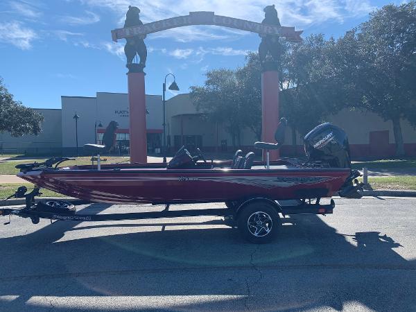Ranger RT188 2024 Ranger RT188 boat on trailer, parked outdoors under a clear sky.