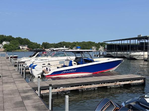 Nor-Tech 340 Sport Center Console 2015 Nor-Tech 340 Sport Center Console boat docked at a marina.