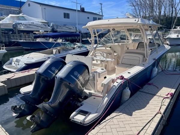 Grady-White Freedom 325 2019 Grady-White Freedom 325 boat docked with twin Yamaha engines.
