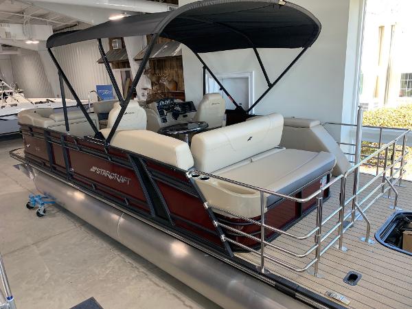 Starcraft SLS 3 Q DH 2024 Starcraft SLS 3 Q DH pontoon boat with beige seating and black canopy.
