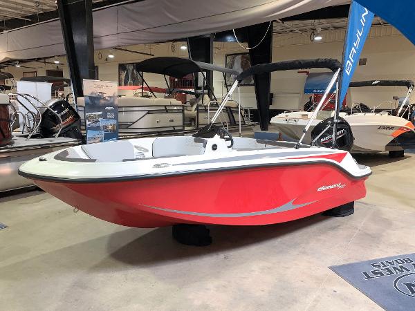 Bayliner Element M15 2024 Bayliner Element M15 boat in showroom, red hull, black canopy, modern design.