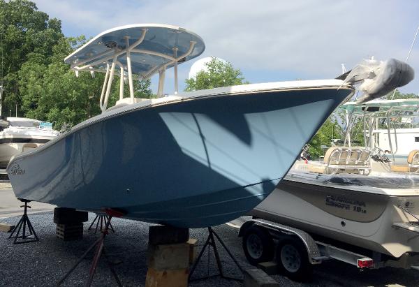 Sea Chaser 24HFC 2023 Sea Chaser 24HFC boat on stands in a marina.