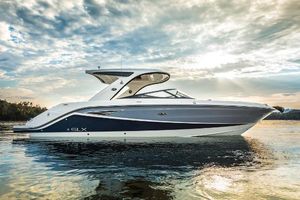 Sea Ray SLX 310 Manufacturer Provided Image: 2018 Sea Ray SLX 310 boat on calm water at sunset.