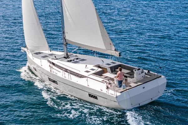 Bavaria C50 2024 Bavaria C50 yacht sailing on open sea with white sails.