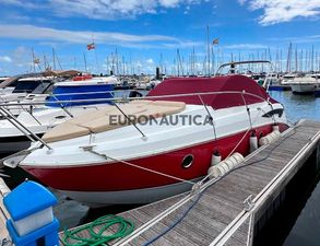 Beneteau Monte Carlo 27 2008 Beneteau Monte Carlo 27 boat docked at marina with red cover.