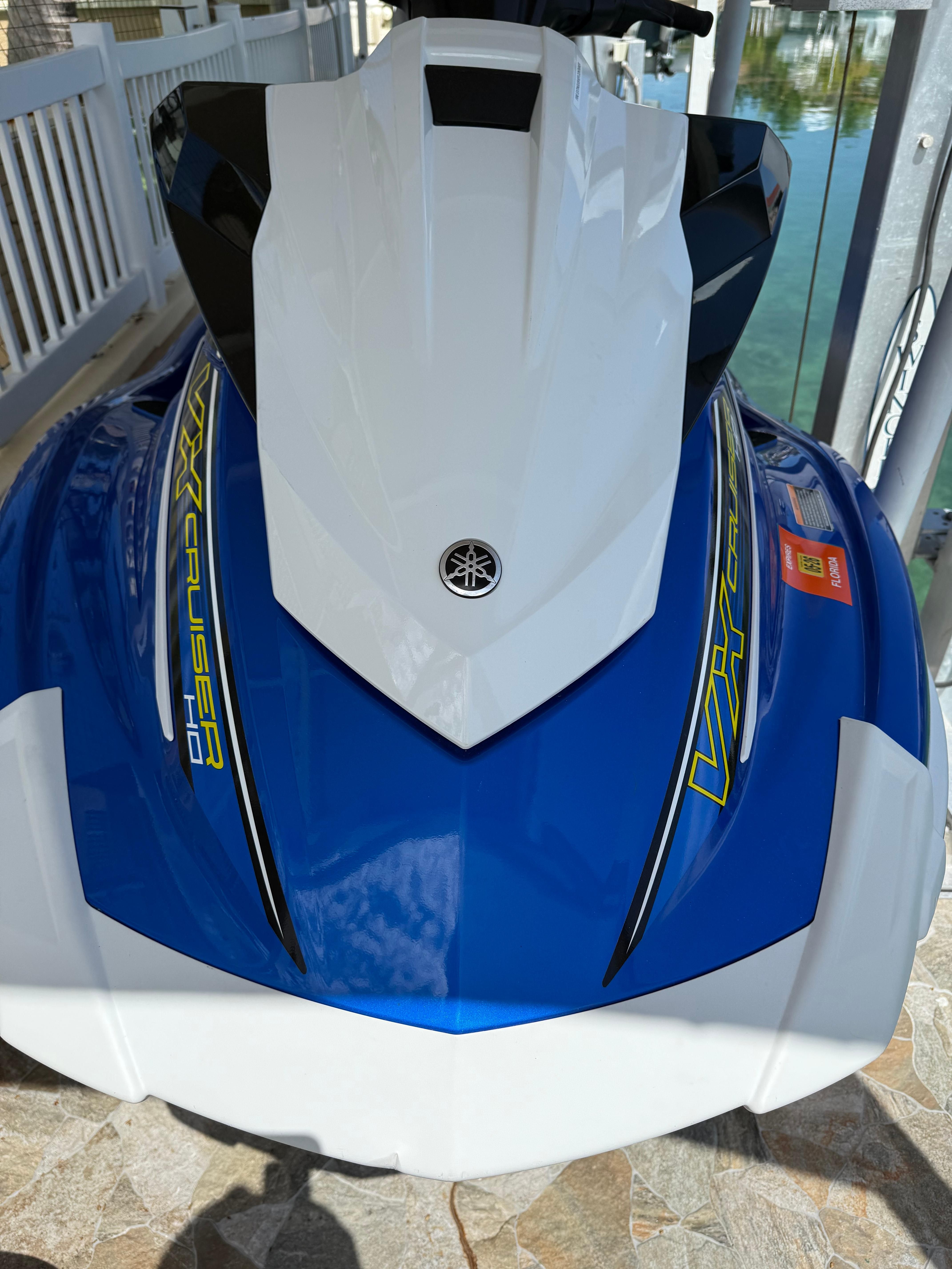 Yamaha WaveRunner VX Cruiser HO 2018 Yamaha WaveRunner VX Cruiser HO in blue and white, docked near water.