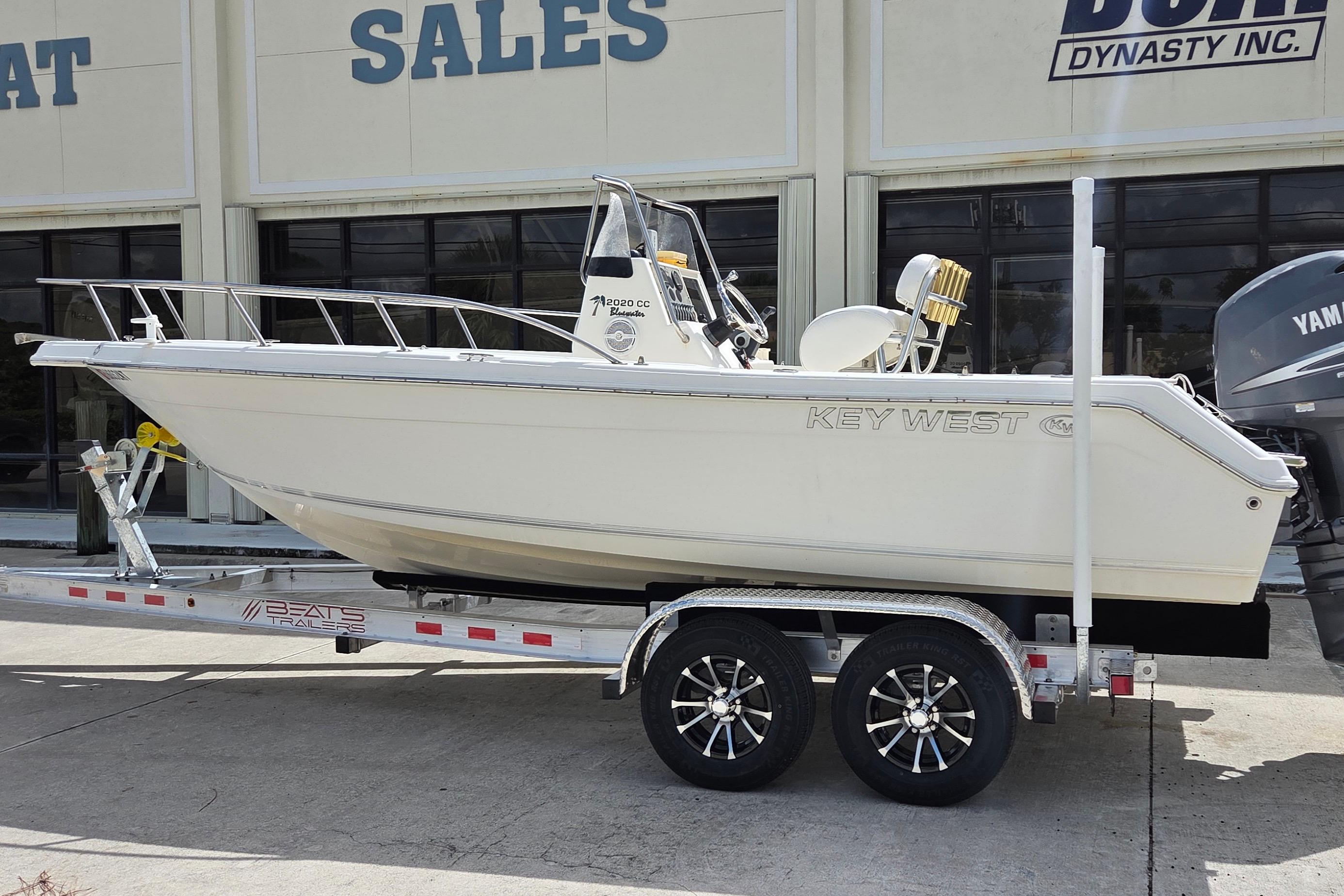 Key West 2020 Center Console Key West 2020 Center Console boat on trailer, displayed outside sales building.
