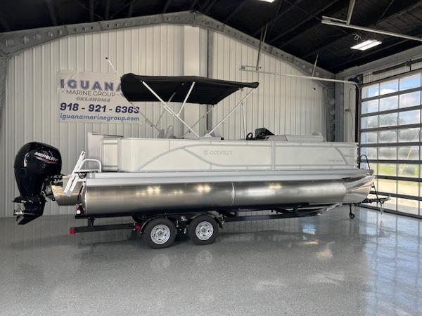 Godfrey SWEETWATER 2286F 2025 Godfrey Sweetwater 2286 F pontoon boat on trailer in showroom.