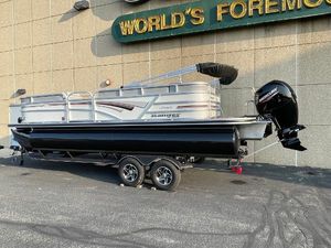 Ranger Reata 220C 2023 Ranger Reata 220C pontoon boat with Mercury outboard motor on trailer.