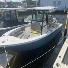 Sea Pro 239 Center Console 2022 Sea Pro 239 Center Console boat docked in marina.