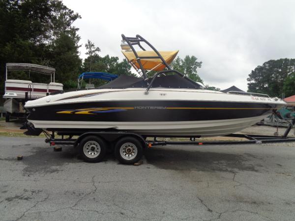 Monterey 218LS Montura 2001 Monterey 218LS Montura boat on a trailer, side view.