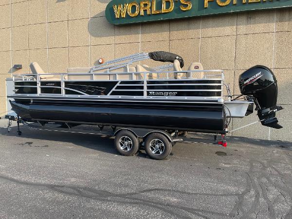 Ranger Reata 220F 2024 Ranger Reata 220F pontoon boat with Mercury engine on trailer.
