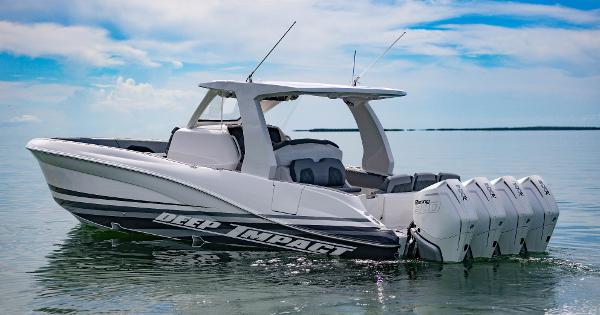 Deep Impact 369 Deep Impact 2024 Deep Impact 369 boat with quad outboard engines on calm water.