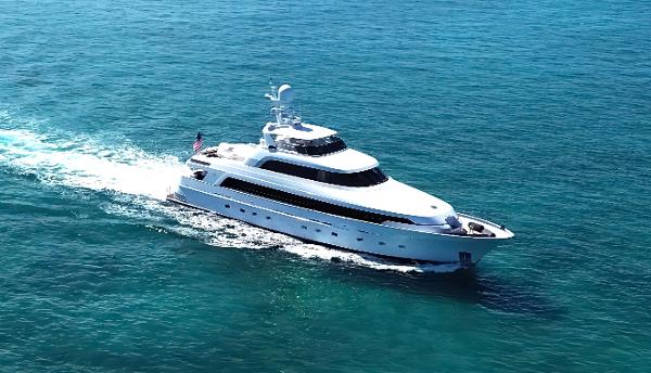 Delta Marine 124 Tri-Deck Delta Marine 124 Motor Yacht cruising on open sea, 2001 model.