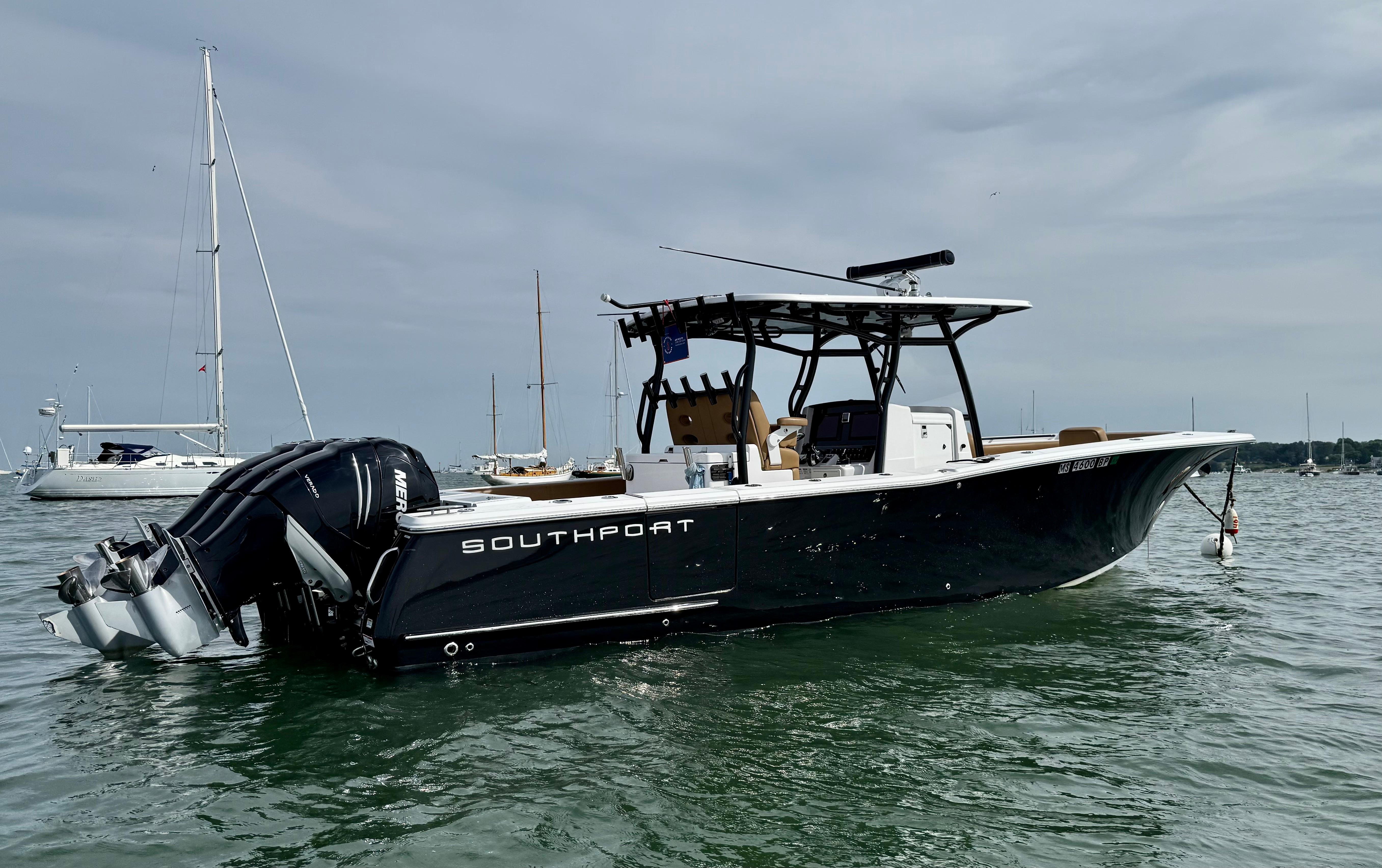 Southport 33 FE 2020 Southport 33 FE boat on water, featuring dual outboard motors.