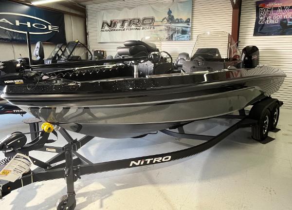 Nitro ZV20 2024 Nitro ZV20 fishing boat on display in showroom, featuring sleek design and modern equipment.