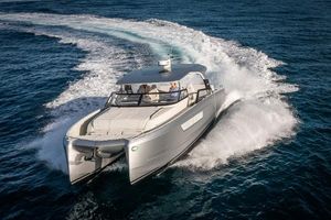 YOT Yot 36 2024 YOT Yot 36 luxury yacht cruising on open water, creating a dynamic wake.