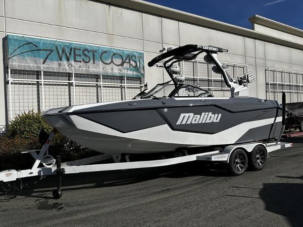 Malibu M230 2025 Malibu M230 boat on trailer at West Coast Boat Center.