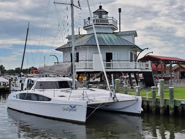 Seawind 1260 2020 Seawind 1260 catamaran docked near a historic lighthouse.
