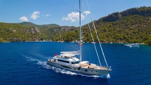 Custom Motorsailer 41M Custom Motorsailer 41M yacht sailing in a scenic bay, 2023 model.