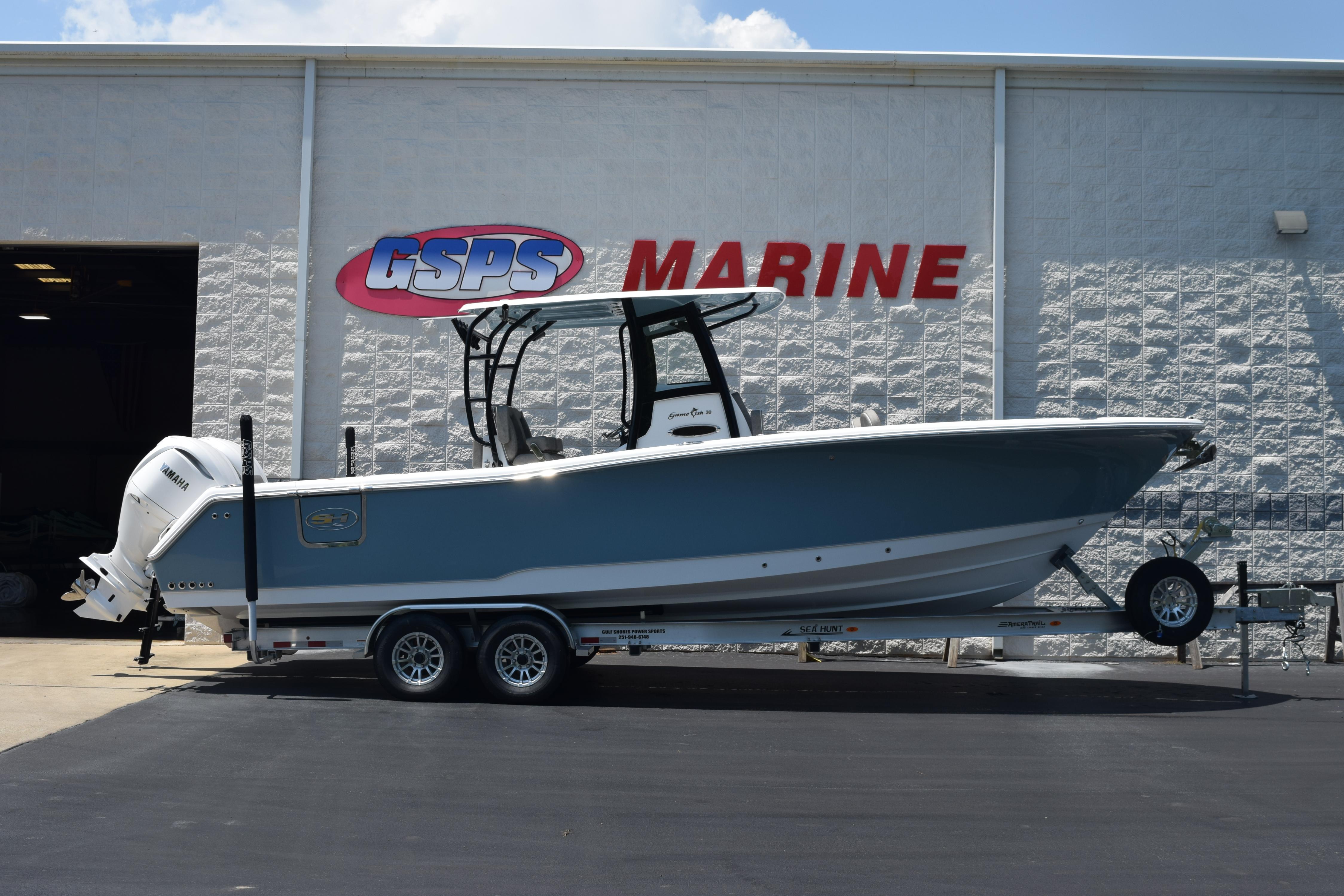 Sea Hunt Gamefish 30 Forward Seating 2026 Sea Hunt Gamefish 30 boat on trailer at GSPS Marine dealership.