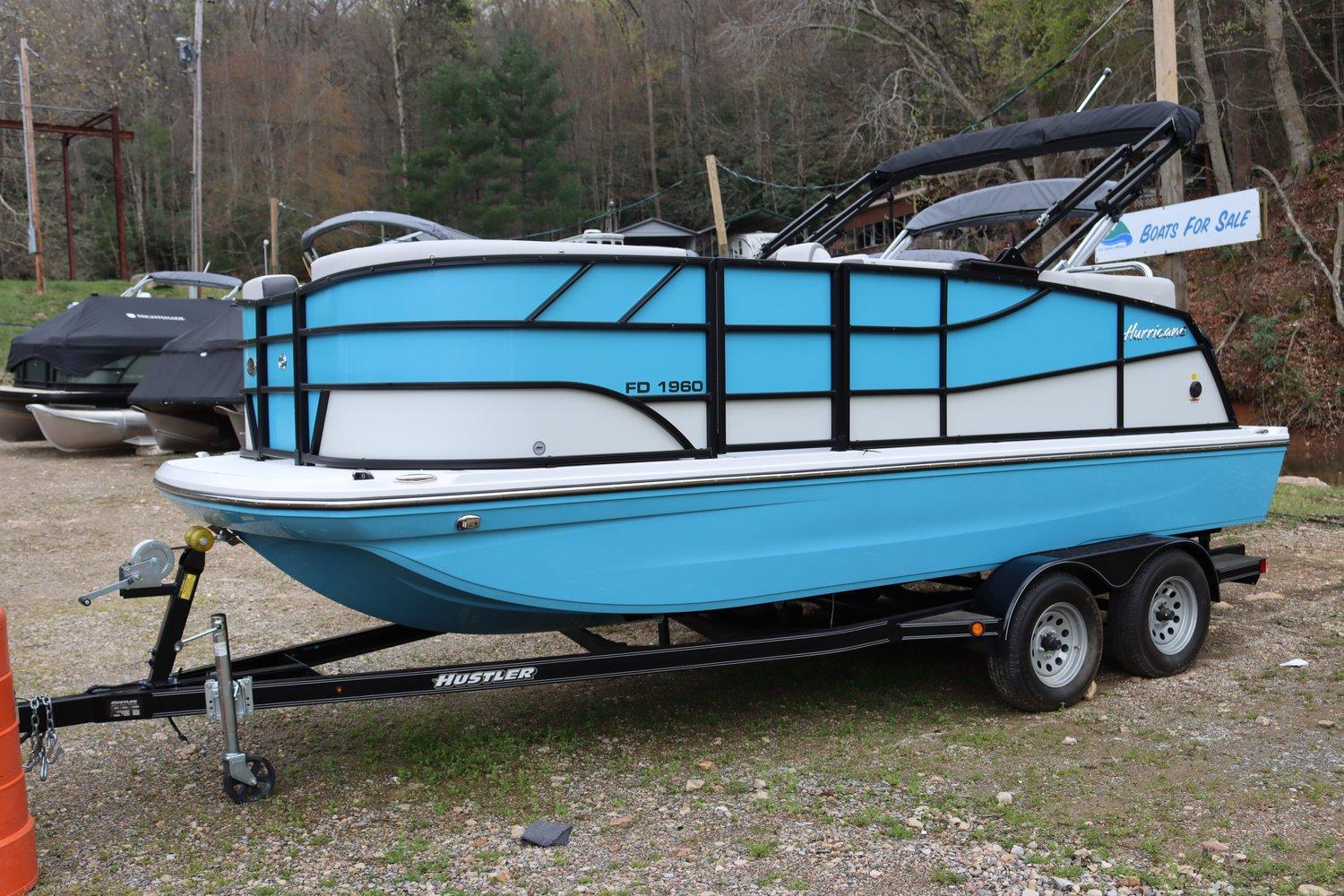Hurricane FD 1960 RE3 OB 2024 Hurricane FD 1960 RE3 OB boat on trailer, displayed for sale outdoors.
