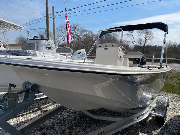 Carolina Skiff 17 LS 2024 Carolina Skiff 17 LS boat on a trailer with a canopy.