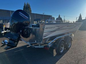 Thunder Jet 209 Rush OT 2025 Thunder Jet 209 Rush OT boat with Mercury outboard motor on a trailer.
