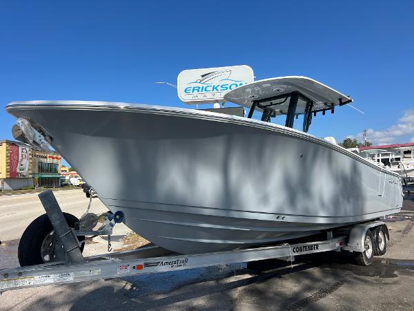 Sportsman Open 262 Center Console 2025 Sportsman Open 262 Center Console boat on trailer under clear blue sky.